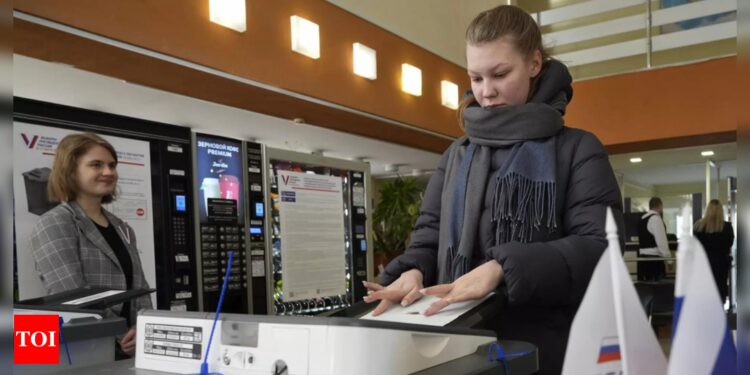 Russians cast ballots in an election preordained to extend President Vladimir Putin’s rule