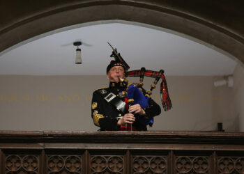Queen’s Piper Plays Bagpipes At Funeral