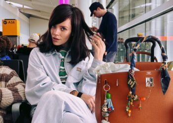 Lily Allen and Dua Lipa Are Backing the “Dated” Bag Charms Trend
