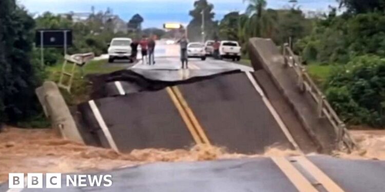Brazil bridge buckles and plunges into river