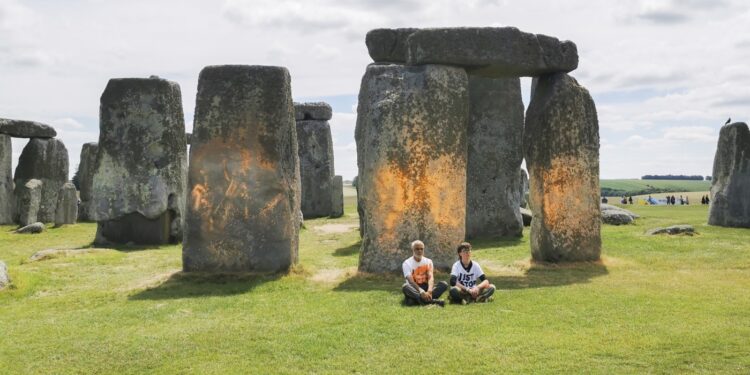 2 climate activists were arrested after spraying orange paint  Stonehenge : NPR