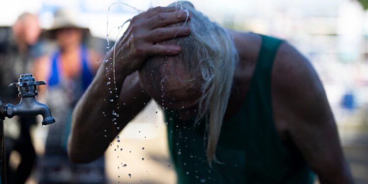 Millions swelter per record-breaking US heatwave that is fanning wildfires | US News